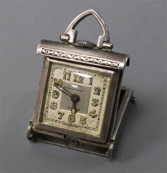 A 1920s engine turned silver Rolex travelling pendant watch, case 30mm.